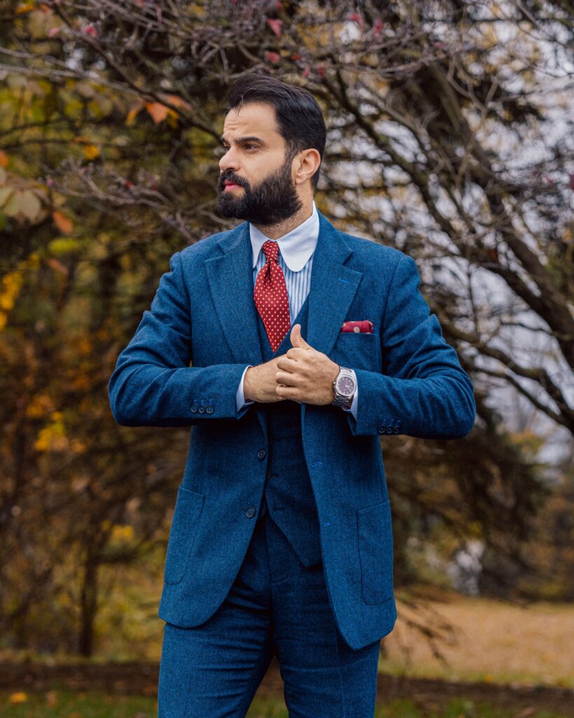 blue tweed suit with red polka dot tie 2025 01 14 11 01 12