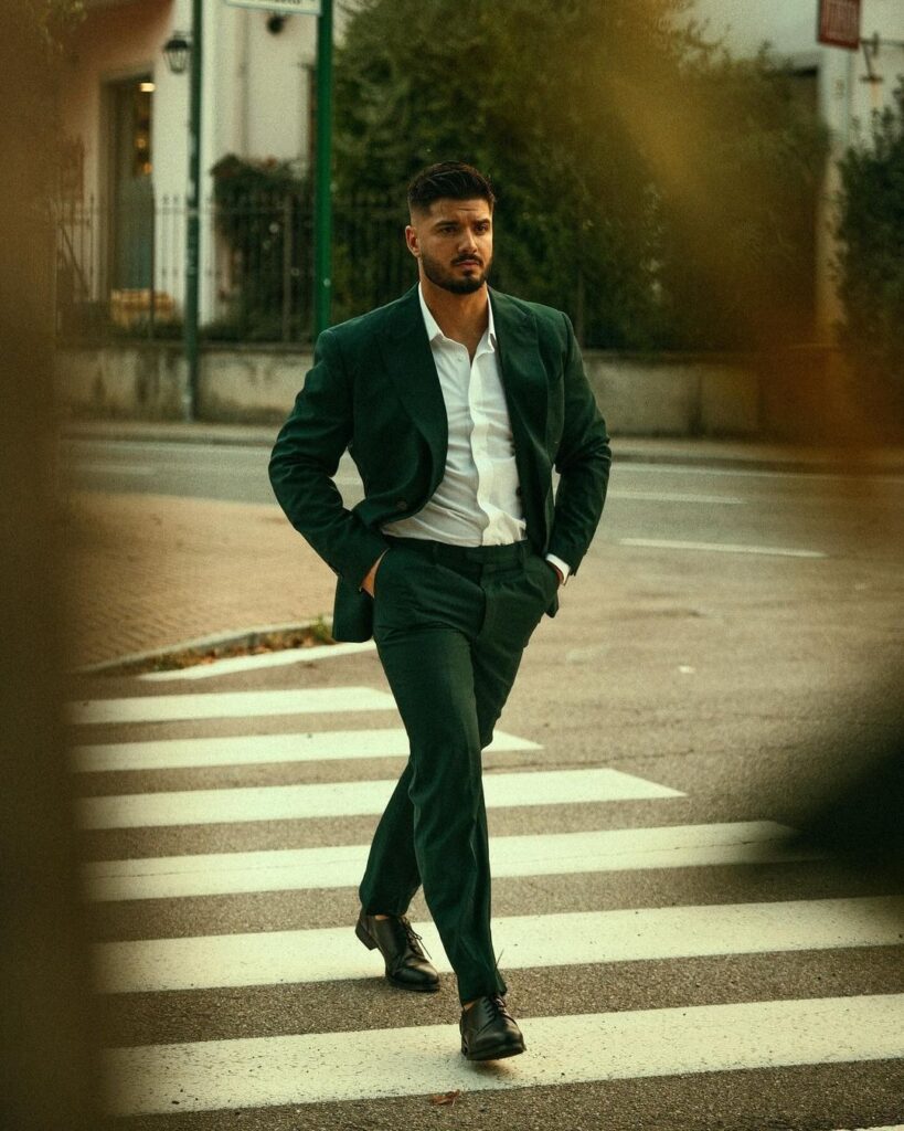 deep green suit with open collar white shirt 2025 01 23 11 32 58