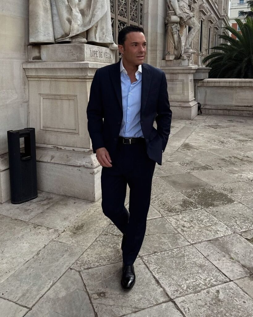 navy suit with striped blue shirt 2024 12 04 15 52 07